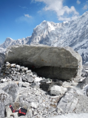 Tashi Labsta base camp which is small space underneath a large boulder