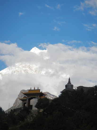 Mt Manaslu (8156m), eight highest mountain in the world, just visible through the clouds