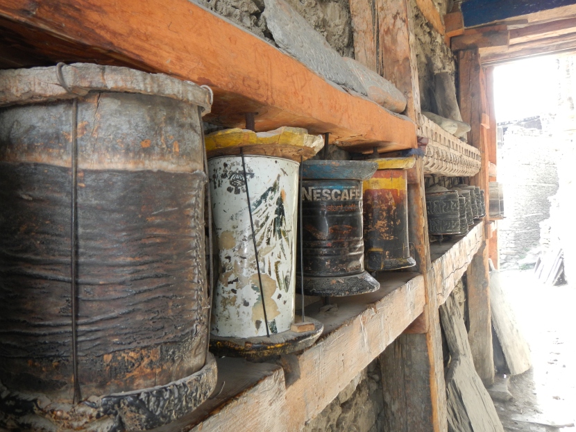 A novel use of cans doubling up as prayer wheels in Manang