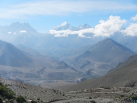 View across the other side of the valley towards the Thorang Lar Pass (5415m) - the large U-shape in the background